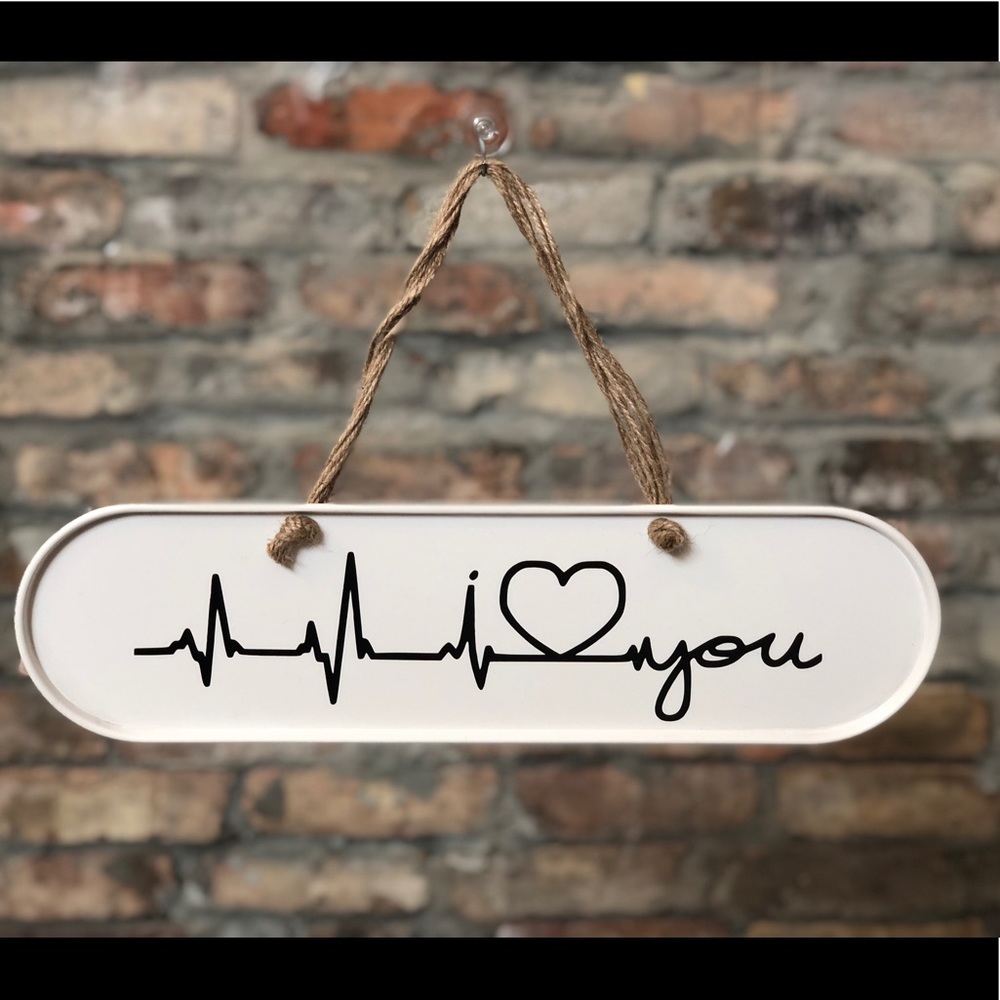 Handmade ‘Love You’ heartbeat sign